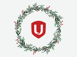 Christmas wreath with the Unifor shield in the centre