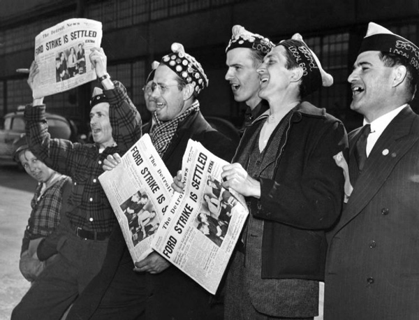 Strikers at Gate 4 of the Ford Motor Co.'s Rouge plant hold up copies of The Detroit News announcing the end of the wildcat strike that prompted Henry Ford to capitulate to unionzation in April 1941.