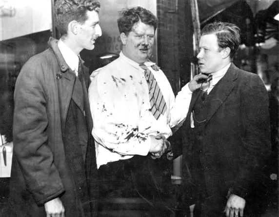 Robert Kanter, Richard Frankensteen and Walter Reuther regroup after they were met with violence by Ford Service Department employees during an UAW organizing attempt at the Ford Rouge Plant, Dearborn, Michigan.