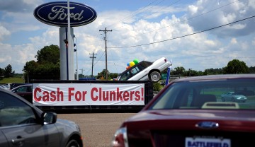 U.S. rebate system, 'cash for clunkers' was the main factor in healthy sales reports released Monday 