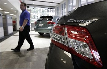 a top selling Toyota Camry is on display in the showroom at the McGeorge Toyota dealership in Richmond, Va. Toyota Motor Corp. said Wednesday, Nov. 25, 2009, it will replace accelerator pedals on 3.8 million recalled vehicles in the United States to address problems with the pedals becoming jammed in the floor mat.(AP Photo/Steve Helber) (Steve Helber - AP)