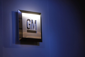 In this Jan. 12, 2009 file photo, the General Motors logo is seen on display at the North American International Auto Show in Detroit. THE ASSOCIATED PRESS/Paul Sancya, File)