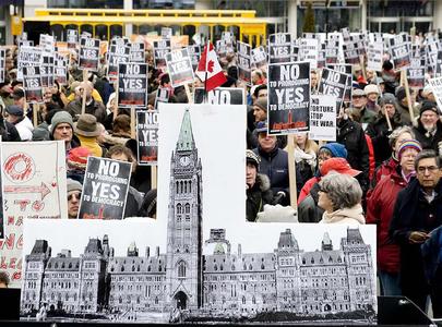 Yonge-Dundas Square was filled Jan. 23, 2010 with placard-waving demonstrators upset at Prime Minister Stephen Harper's decision to suspend Parliament.