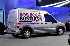 The 2010 Ford Transit Connect is the automaker's first global product. Vinyl graphics transform the white van into a rolling billboard. (Ford photos)