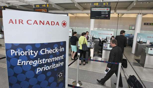 Check-in staff at Air Canada could be walking the picket line at midnight Monday, June 13, 2011.