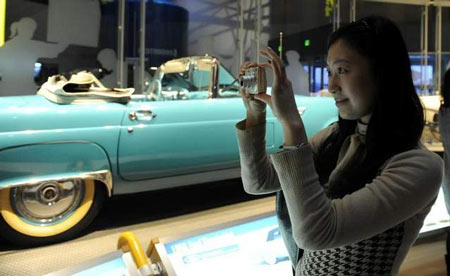 Shanghai University student Jessie Yang pauses on the Rouge factory tour in 2011. More than 1 million have taken the tour. (David Coates / The Detroit News)