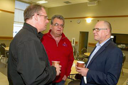 John Harte, financial secretary for Unifor Local 252, Mike Shields, staff rep for Unifor, and Sid Ryan, president, Ontario Federation of Labour, chat prior to a meeting of union executives to discuss strategy for the upcoming provincial election.(Photos by Bryon Johnson)