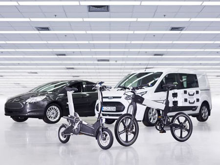 Ford showcased two prototype e-bikes — MoDe:Me, left, and MoDe:Pro — that can fold into a vehicle on Monday. The introduction was made at the Mobile World Congress in Barcelona.