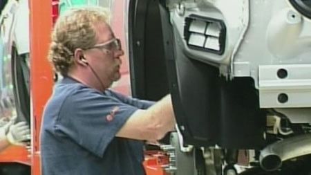 Cami plant worker on the assembly line in Ingersoll