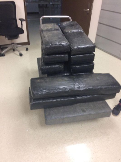 Ford employees turned over 277 pounds of marijuana found in a shipment of vehicles to federal authorities Wednesday.