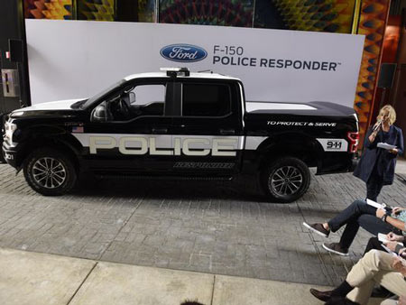 Michele Bartlett, Ford's general manager of comerical and government fleet sales, introduce the new F-150 Police responder.