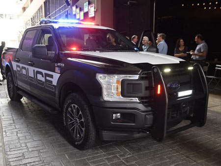 Side profile of the new F-150 police responder. Ford reveals the industry's first police pursuit pickup, the F-150 police responder, at the Belt in downtown Detroit. (Photo: Clarence Tabb Jr. / The Detroit News)