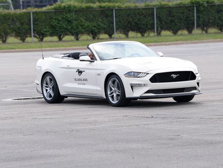 The 10 millionth Mustang enters the gate at Ford's Flat Rock Assembly plant Wednesday, August 8, 2018, to join other Mustangs to make a formation spelling out 10,000,000.    Clarence Tabb Jr., The Detroit