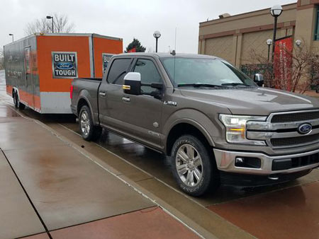 The Ford F-150 diesel can tow up to 11,400 pounds. This car trailer weighs a little over 6,000 pounds, and the Ford towed it without incident — an electronic sensor once intervening to dampen trailer sway on a rainy day.  Henry Payne, The Detroit News