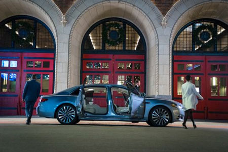 The new Continental's electronically controlled doors cannot be opened if the car is moving more than 2 miles per hour. That's because wind can swing suicide doors open and imperil the backseat passenger. (Photo: Lincoln