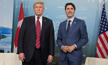 President Donald Trump, seen with Canada's Prime Minister Justin Trudeau during the G7 Summit in Quebec on June 8. Photo credit: REUTERS 