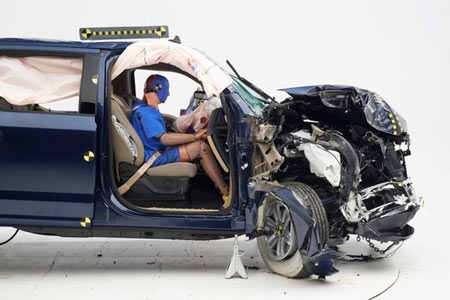 The dummy's position in relation to the door frame and dashboard after the crash test indicates that the passenger's survival space was maintained well in the 2019 Ford F-150 SuperCrew (Photo: IIHS)