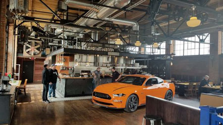 Ford debuted the Ford Mustang Ecoboost High Performance to media at the Cork & Gabel restaurant in Corktown across from Ford's new train station tech building.  (Photo: Henry Payne, The Detroit News)