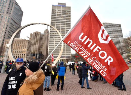 Unifor Local 222 Oshawa, Ontario, Canada plant worker Ron Van De Walker, of Oshawa, joins U.S. UAW workers as he and several co-workers made the 4.5 hour drive from Canada to participate in the Hart Plaza candlelight vigil. Todd McInturf, The Detroit News