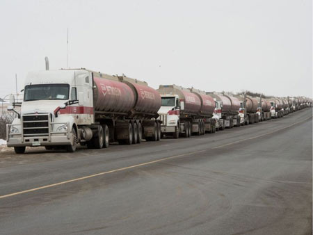 Fuel trucks wait along the side of Fleet Street in Regina, Saskatchewan on Dec. 12, 2019. Unifor workers, who are currently locked out of the Co-op Refinery Complex, are disrupting the flow of traffic in and out of the complex. BRANDON HARDER / Regina Leader-