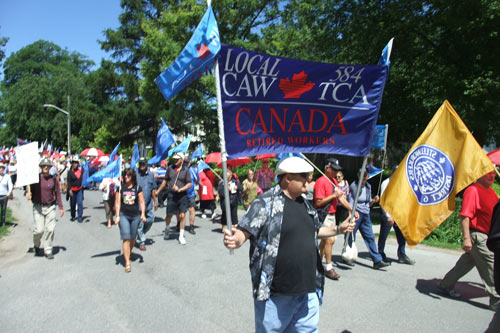 Doug Berry Leads the March to Queens Landing where the Premiers were gathered