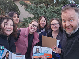 Six people canvassing smiling 