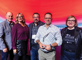 2024 Bud Jimmerfield Award recipient stands with Unifor leadership at 2024 Canadian Council
